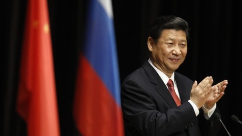 Chinese President Xi claps during his address to students at the Moscow State Institute of International Relations