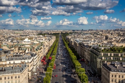 Taken from atop the Arc de Triomphe, you can see the Avenue des Champs-Élysées, one of the most famous streets in Paris. The Champs-Élysées is lined with high end shops and restaurants and stretches from the Place de la Concorde to the Place Charles de Gaulle.