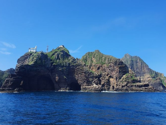 Эми Андерсонның үлкен сиськилері