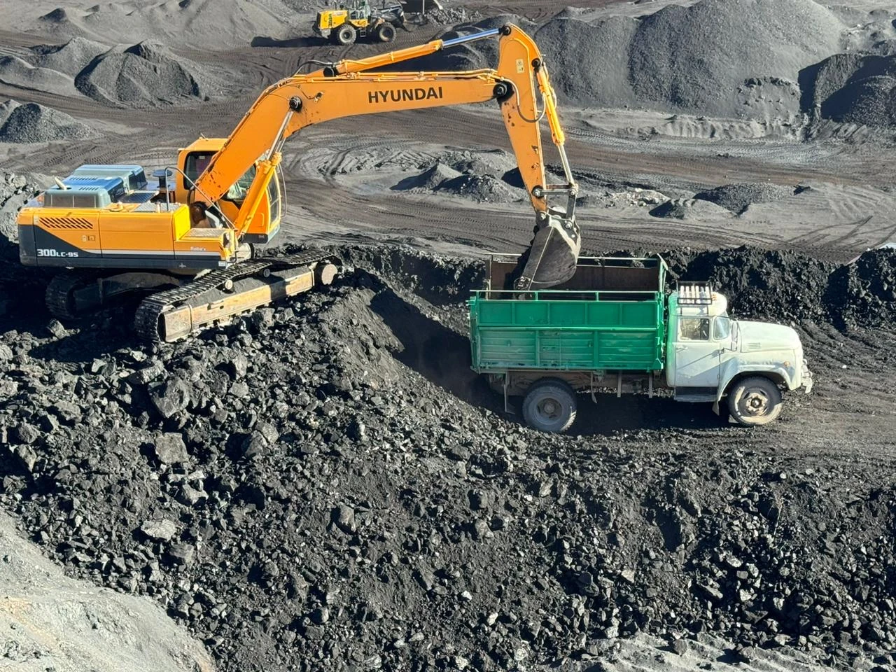 Ошақтың отын маздатқан